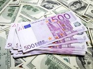 Банк России вновь снизил курсы доллара и евро